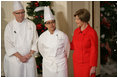 Mrs. Laura Bush is joined by White House Executive Chef Cris Comerford, and Bill Yosses, White House Pastry Chef, during the 2008 White House Holiday Press Preview Wednesday, Dec. 3., 2008, in the East Room. Said Mrs. Bush, "This is a special holiday for us... our final in the White House. Thank you to the American people for their friendship, prayers, and support. The President and I wish you and your families a very happy holiday."