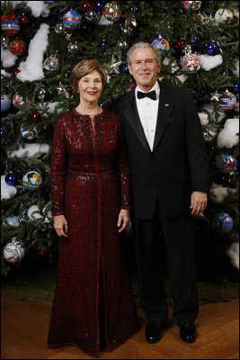 President George W. Bush and Mrs. Laura Bush pose for their 2008 holiday portrait Sunday, Dec. 7, 2008, in the Blue Room of the White House.