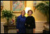 Mrs. Laura Bush poses Tuesday, Dec. 16, 2008, with Mrs. Ana Ligia Mixco Sol de Saca, wife of El Salvador's President Elias Antonio Saca, after Mrs. Saca's arrival in the Residence of the White House for a coffee.