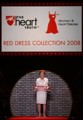 Mrs. Laura Bush addresses guests and participants at The Heart Truth Red Dress Collection 2008 fashion show in New York, Friday, Feb. 1, 2008. More than a dozen celebrated women showcased America's top designers in one-of-a-kind Red Dresses to raise awareness of heart disease in women.