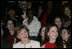 Mrs. Laura Bush, accompanied by daughter, Barbara Bush, watch fashion models during The Heart Truth Red Dress Collection 2008 fashion show in New York, Friday, Feb. 1, 2008. More than a dozen celebrated women showcased America’s top designers in one-of-a-kind Red Dresses to raise awareness of heart disease in women.