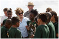 Mrs. Laura Bush visits with Florida City Elementary School students Wednesday, Feb. 6, 2008, during the Junior Ranger "First Bloom" planting event in Everglades National Park, Fla. President Bush on Monday asked Congress to spend $215 million for restoration of the Everglades.
