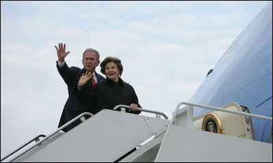 President George W. Bush and Mrs. Laura Bush wave from Air Force One as they board the aircraft Friday, Feb. 16, 2008, at Andrews Air Force Base en route to Benin, the first stop on their five-country, African visit.