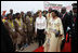Mrs. Laura Bush and Madame Chantal de Souza Yayi, First Lady of Benin, walk the red carpet upon the arrival Saturday, Feb. 16, 2008, of Mrs. Bush and President George W. Bush to Benin.