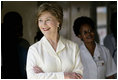 Mrs. Laura Bush smiles as she meets with patients and staff Monday, Feb. 18, 2008, doing a tour of the outpatient clinic at the Meru District Hospital in Arusha, Tanzania.