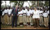 President George W. Bush and Mrs. Laura Bush pose for a photo with the Lycee de Kigali students Tuesday, Feb. 19, 2008 in Kigali, Rwanda.