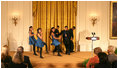 Ritmo en Accion, from Jamaica Plain, Massachusetts, performs during the Coming Up Taller awards ceremony Monday, Jan. 28, 2008, in the East Room of the White House. The youth dance initiative was created in 2001 by the Hyde Square Task Force to combat high crime, violence and low student achievement in its tough, inner-city Boston neighborhood.