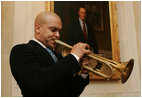 Jazz trumpeter Irvin Mayfield entertains during a reception at the White House, Monday, Jan. 28, 2008, prior to the State of the Union. Mr. Mayfield, a New Orleans native and appointed cultural ambassador for the city, joined Mrs. Laura Bush in the First Lady's Box for the President's address.