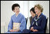 Mrs. Laura Bush smiles as she joins Mrs. Kiyoko Fukuda, left, spouse of Japan's Prime Minister Yasuo Fukuda, and other G-8 spouses at a traditional Japanese cultural program Monday, July 7, 2008, at the Windsor Hotel Toya Resort and Spa in Toyako, Japan.