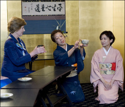 Mrs. Laura Bush receives instruction Monday, July 7, 2008, from Ms. Soko Sakurai on the art of preparing a bowl of tea. Ms. Sakurai is the Tea Master at the Urasenke School, which is active in fostering international goodwill through cultural exchange. Mrs. Bush and spouses of G-8 leaders participated in the tea ceremony during a traditional Japanese cultural program in Toyako, Japan, site of the 2008 G-8 Summit.