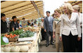 Mrs. Laura Bush joins spouses of the G-8 leaders as they visit the Hokkaido Marche (northern farm market), in Makkari Village Tuesday, July 8, 2008. The Hokkaido Marche was especially organized by the local residents on the occasion of the Summit, with the aim of illustrating the richness of locally produced foods.