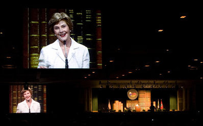 As Mrs. Laura Bush gives her remarks from the stage, giant video screens project her image for the 5,400 participants to see at Monday's Fifth Annual Reading First National Conference. The gathering was at the Gaylord Opryland Resort and Convention Center in Nashville, Tenn., on July 28, 2008.