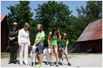 Mrs. Laura Bush meets students holding goats Monday, July 28, 2008, during a tour of the Old Goat Barn at the Carl Sandburg Home National Historic Site in Flat Rock, N.C. Mrs. Bush participated in Junior Ranger program events at the historical site and announced a $50,000 grant in support of the Junior Ranger programs.