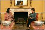 Mrs. Laura Bush meets with Mrs. Begum Gillani, wife of Pakistani Prime Minister Yousaf Raza Gillani, during coffee at the White House on July 29, 2008.