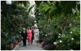 Mrs. Lynne Cheney, Mrs. Laura Bush, and Labor Secretary Elaine Chao are led on a tour of the United States Botanic Garden in Washington, D.C. by Mrs. Grace Nelson, Chair of the Senate Spouses' Luncheon Committee, Tuesday, June 3, 2008, prior to a luncheon honoring Mrs. Bush.