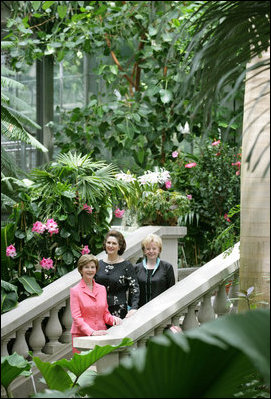 Mrs. Laura Bush stands with Lynda Bird Johnson Robb, center, and Mrs. Lynne Cheney inside the United States Botanic Garden in Washington, D.C., at the Senate spouse's luncheon Tuesday, June 3, 2008.