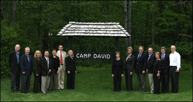 Mrs. Laura Bush poses with directors of the Presidential Libraries Wednesday, June 4, 2008, during their visit to Camp David in Thurmont, Maryland.