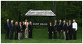 Mrs. Laura Bush poses with directors of the Presidential Libraries Wednesday, June 4, 2008, during their visit to Camp David in Thurmont, Maryland.
