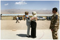 Mrs. Laura Bush is greeted by Governor Habiba Sarabi after arriving in Bamiyan province Sunday, June 8, 2008. Appointed in 2005, the former Minister of Women's Affairs is the only female governor in Afghanistan.