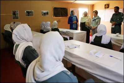 Mrs. Laura Bush and Governor Habiba Sarabi, in white, meet with female police trainees who will graduate June 15th from Non-Commissioned Officer Training during a visit Sunday, June 8, 2008, to the Police Training Academy in Bamiyan, Afghanistan.