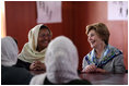 Mrs. Laura Bush smiles as she meets Sunday, June 6, 2008, with female graduates of the Police Training Academy in Bamiyan province in Afghanistan. With her is Bamiyan Governor Habiba Sarabi.