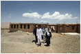 Mrs. Laura Bush is joined by Governor of Bam iran Province, Habiba Sarabi, right, and students, during a tour of the future site of the Ayenda Learning Center Sunday, June 8, 2008, in Bamiyan, Afghanistan.The tour was led by Ihsan Ullah Bayat, far left. Once completed, the Ayenda Learning Center will provide a safe and nurturing environment for 128 of Bamiyan most disadvantaged children to live. At the same time, it will provide educational opportunities for as many as 210 children in the region.