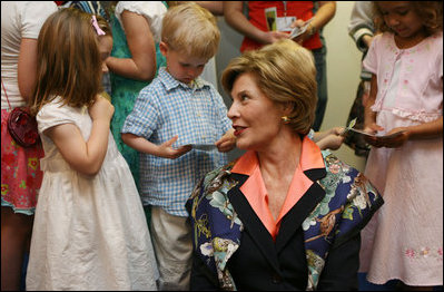 Mrs. Laura Bush talks to children during her visit to the United States Embassy Tuesday, June 10, 2008, in Kranj, Slovenia.