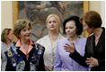Mrs. Laura Bush and Slovenia's First Lady Barbara Miklic Turk listen as Dr. Barbara Jaki, right, conducts a tour of the National Gallery of Slovenia Tuesday, June 10, 2008 in Ljubljana, Slovenia.