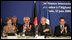 Mrs. Laura Bush joins in the applause during the U.S.-Afghan Donor's Conference Thursday, June 12, 2008 in Paris, where Mrs. Bush addressed the conference urging continued support for the Afghanistan people to build civic and economic institutions that can withstand the forces of oppression. Mrs. Bush is joined on the panel, from left, Afghanistan Foreign Minister Dr. Rangin Dadfar Spanta, Afghanistan President Hamid Karzai and French President Nicholas Sarkozy.