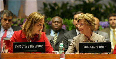 Mrs. Laura Bush talks with World Food Program Executive Director Josette Sheeran during the plenary session at the WFP conference Thursday, June 12, 2008, in Rome.
