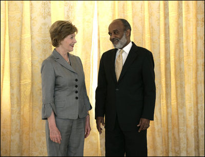 Mrs. Laura Bush meets with Haiti's President Rene Preval Thursday, March 13, 2007 at the National Palace in Port-au-Prince, Haiti, prior to Mrs. Bush's visit to the GHESKIO HIV/AIDS Center, the U.S. Embassy and the College de St. Martin Tours education program.