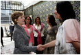 Mrs. Laura Bush is greeted Friday, March 14, 2008, on her arrival to a meeting of the Mexican Association Against Breast Cancer (Fundacion Cim*ab) in Mexico City. From left are Mrs. Maria Asuncion Garza, wife of U.S. Ambassador to Mexico Antonio Garza, Jr., Mrs. Margarita Zavala, wife of Mexico's President Felipe Calderon, Ms. Bertha Aguilar de Garcia, president of Cim*ab, and Ms. Rosaela Gijon, director of Cim*ab.