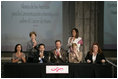 Mrs. Laura Bush applauds following the signing of the U.S.-Mexico Partnership for Breast Cancer Awareness and Research agreement between the Susan G. Komen for the Cure, MD Anderson Cancer Center, U.S. State Department, the Instituto Nacional de Cancerologia and Mexican Association Against Breast Cancer (Fundacion Cim*ab) Friday, March 14, 2008, at the Interactive Economics Museum in Mexico City. From left are Bertha Aguilar, Dr. Alejandro Mohar, U.S Ambassador to Mexico Antonio O. Garza, Jr., Hala Moddelmog, Margarita Zavala (standing), and Dr. Kendra Woods.