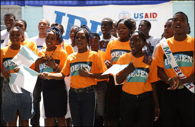 A choir sings a welcome song for Mrs. Laura Bush during her visit to the IDEJEN educational program at the College de St. Martin Tours Thursday, March 13, 2007, in Port-au-Prince, Haiti.