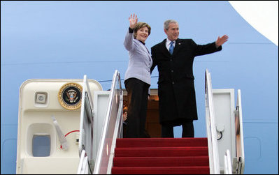 President George W. Bush and Mrs. Laura Bush wave as they board Air Force One Monday, March 31, 2008, for departure to Kyiv, Ukraine, the first stop on their European visit that will include the NATO Summit in Bucharest. 