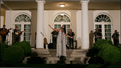 Singer Shaila Durcal and the Mariachi Campanas de America entertain President George W. Bush, Laura Bush, and their guests in the Rose Garden Monday evening, May 5, 2008, during a social dinner at the White House in honor of Cinco de Mayo.