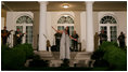 Singer Shaila Durcal and the Mariachi Campanas de America entertain President George W. Bush, Laura Bush, and their guests in the Rose Garden Monday evening, May 5, 2008, during a social dinner at the White House in honor of Cinco de Mayo.