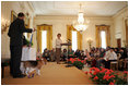 Mrs. Laura Bush welcomes the Westminster Kennel Club's 2008 Best in Show winner, Uno, Monday, May 5, 2008 , to the East Room of the White House. 