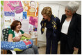 Mrs. Laura Bush and Mrs. Aliza Olmert, spouse of Israel's Prime Minister Ehud Olmert, greet a young mother in the Breast Feeding Education Room during a visit to the Tipat Chalav-Gonenim Neighborhood Mother and Child Care Center in Jerusalem Wednesday, May 14, 2008. There are 30 similar centers throughout the city providing prenatal, postnatal and preventative care and advice on breastfeeding, nutrition, immunizations and disease screening.