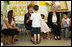 Mrs. Laura Bush shares a moment with a kindergarten student Wednesday, May 14, 2008, at the Hand in Hand School for Jewish-Arab Education in Jerusalem. Mrs. Bush took the opportunity to visit the school with Mrs. Aliza Olmert, right, spouse of Israeli Prime Minister Ehud Olmert.