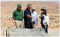 Prime Minister Ehud Olmert, Mrs. Laura Bush and Mrs. Aliza Olmert listen as President George W. Bush talks about the water system at Masada, the historic fortress built by King Herod of Judea. The couple's toured the National Park Thursday, May 15, 2008, during the visit to Israel by President and Mrs. Bush to help celebrate the 60th anniversary of the country's independence.
