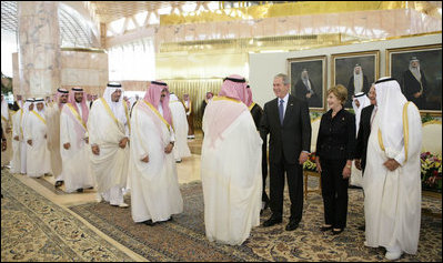 President George W. Bush and Mrs. Laura Bush are greeted by the Saudi delegation as they stand with King Abdullah bin Abdulaziz during arrival ceremonies Friday, May 16, 2008, at Riyadh-King Khaled International Airport in Riyadh.