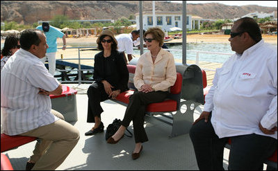 Mrs. Laura Bush listens to Dr. Mohamed Salem, Head of the South Sinai Protectorates, Egyptian Environmental Affairs Agency, as they prepare to depart for a coral reefs and ocean conservation tour Saturday, May 17, 2008, in Sharm El Sheikh, Egypt. Joining them are Ms. Hilda Arellano, USAID Cairo Mission Director, and Mr. Amir Ali, Hurghada Environmental Protection and Conservation Association. 