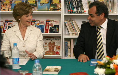 Mrs. Laura Bush smiles as she participates in a Big Read Egypt/U.S. roundtable discussion Sunday, May 18, 2008, with students at the Fayrouz Experimental School for Languages at Sharm El Sheikh. Mrs. Bush told the participants that the Big Read partnership will use literature to enhance understanding of each other’s societies and will also awaken the joy of reading in both Egyptians and Americans, particularly young people. Sitting with her is Dr. Yousry Saber Hussein El-Gamal, Minister of Education.
