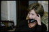 Mrs. Laura Bush speaks on the phone with Michelle Obama Wednesday, Nov. 5, 2008 in the family residence at the White House. Mrs. Bush assured Mrs. Obama that they will enjoy living at the White House, and that it is a wonderful place to raise a family. Also Mrs. Bush extended an invitation to the Obama family to visit the White House.