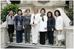 Mrs. Laura Bush stands for photographs on the steps of the Government Palace Residence Saturday, Nov. 22, 2008, with spouses of APEC leaders following a breakfast hosted by Mrs. Pilar Nores de Garcia, First Lady of Peru, in Lima. With her, from left are: Madam Ho, Spouse of Prime Minister Lee Hsien Loong of Singapore; Mrs. Kristiani Herawati, spouse of Indonesia's President Susilo Bambang Yudhoyono; Mrs. Bush; Mrs. Pilar Nores Bodereau de Garcia, spouse of Peru's President Alan Garcia; Mrs. Kim Yoon-ok, spouse of President Lee Myung-bak; Mrs. Rosmah Mansor, spouse of Malaysian Deputy Prime Minister Najib Razak, and Mrs. Chikako Aso, wife of Prime Minister Taro Aso of Japan.