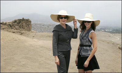 Mrs. Laura Bush and Ms. Barbara Bush stand inside the Pachacamac Archaeological Site in Lurin, Peru, Saturday, Nov. 22, 2008, during a tour of the ruins as part of the APEC Spouses Program. The Pachacamac site is a complex of adobe pyramids in the Lurin valley, on Peru's central coast, and dates from AD 200.