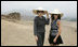 Mrs. Laura Bush and Ms. Barbara Bush stand inside the Pachacamac Archaeological Site in Lurin, Peru, Saturday, Nov. 22, 2008, during a tour of the ruins as part of the APEC Spouses Program. The Pachacamac site is a complex of adobe pyramids in the Lurin valley, on Peru's central coast, and dates from AD 200.