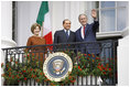 President George W. Bush andMrs. Laura Bush stand with Italian Prime Minister Silvio Berlusconi on the balcony of the South Portico of the White House Monday, Oct. 13, 2008, during Prime Minister Berlusconi's official welcome to the White House.