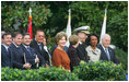 Mrs. Laura Bush stands on the South Lawn of the White House Oct. 13, 2008, during the State Arrival for Italian Prime Minister Silvio Berlusconi. Standing next to Mrs. Bush near the arrival podium are Mrs. Deborah Mullen, Admiral Mike Mullen, Chairman of the Joint Chiefs of Staff, Secretary of State Condoleezza Rice and Vice President Dick Cheney.